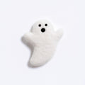 A small white felt ghost toy with black eyes and mouth, photographed on a clean white background.
