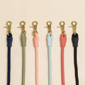 Best selling Awoo multifunctional handsfree Infinity leash in 6 colours; olive green, navy blue, peach pink, black, spice red and light blue slate. Made from recycled polyester, low impact silicone and chemically untreated gold brass clasps. 
