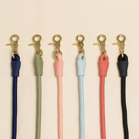 Best selling Awoo multifunctional handsfree Infinity leash in 6 colours; olive green, navy blue, peach pink, black, spice red and light blue slate. Made from recycled polyester, low impact silicone and chemically untreated gold brass clasps.