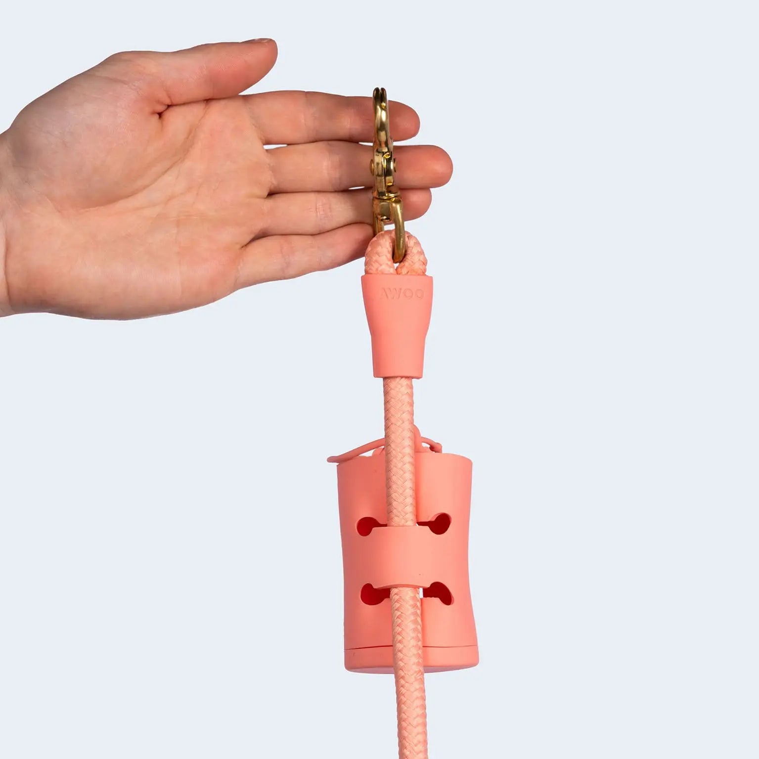 AwPoo Bag Holder: The silicone dangle-free waste bag holder for