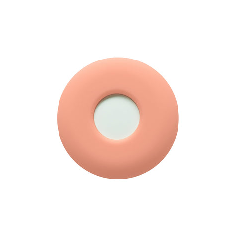 Peach pink silicone fetch AirTag holder containing Apple AirTag for your dogs collar or dogs harness.